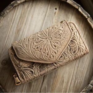 Stunning handmade carved leather wallet/crossover